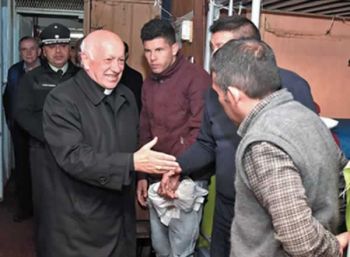 Archbishop of Chile, Cardinal Ricardo Ezzati visits a prison.