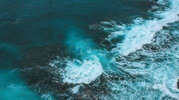 Ocean waves pound the shoreline