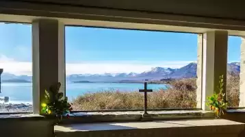 Windows overlooking a bay.