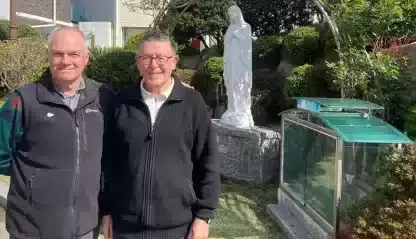 Frs. John Boles and Michael O'Grady at the "18th May Cemetary"