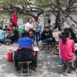 Lunch under the tree blossoms in Zibo, Zhoucun Diocese.