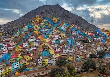 Impoverished district of Lima, Peru, that is built on a mountain side.