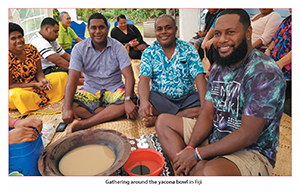 Gathering around the yacona bowl in Fiji