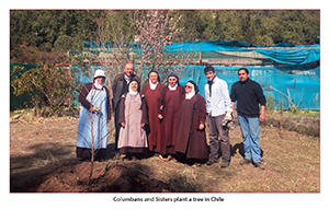 Columbans and Sisters plant a tree in Chle