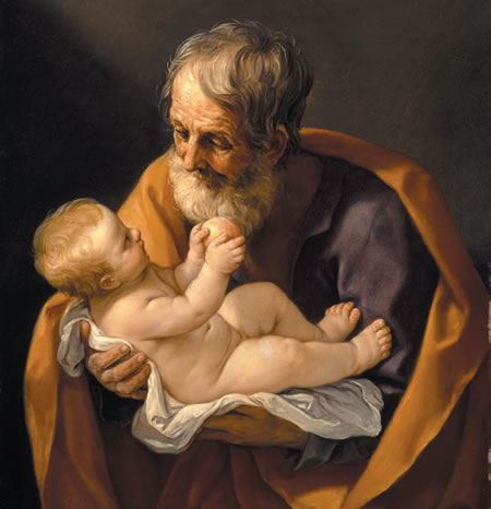 Joseph holding Baby Jesus