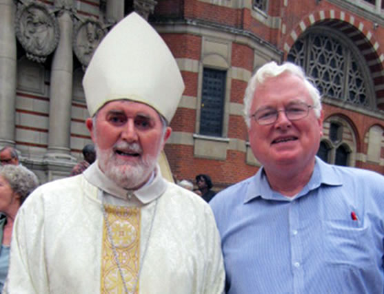 Fr. Peter Hughes (right) at a Mass for Migrants