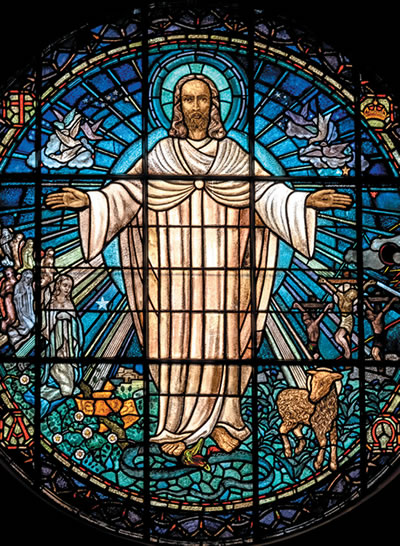 Stained glass window of resurrected Jesus