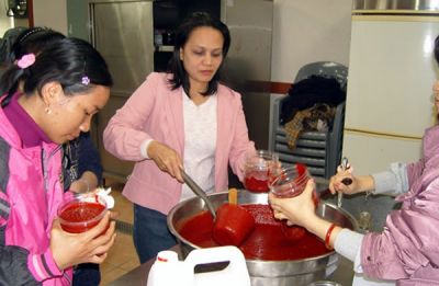 Cita during a demo on the preparation of Korean chile paste