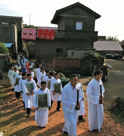 Good Friday procession around the village