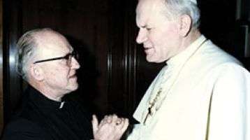 Fr. Aeden McGrath with Saint Pope John Paul II