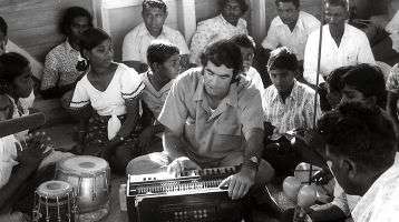 A young Fr. Frank Hoare singing with Indo-Fijian parishioners