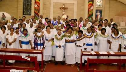 58 newly installed Catechists with Archbishop Peter Loy