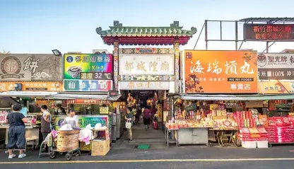 People shopping around the Hsinchu City God Temple
