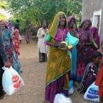 People carrying food rations