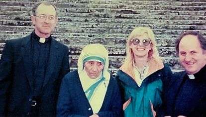 Meeting Mother Teresa. From left, Columban Fr. Maurice Hogan, Mother Teresa, Ms. McAteer and Columban Fr. Donal McIlraith