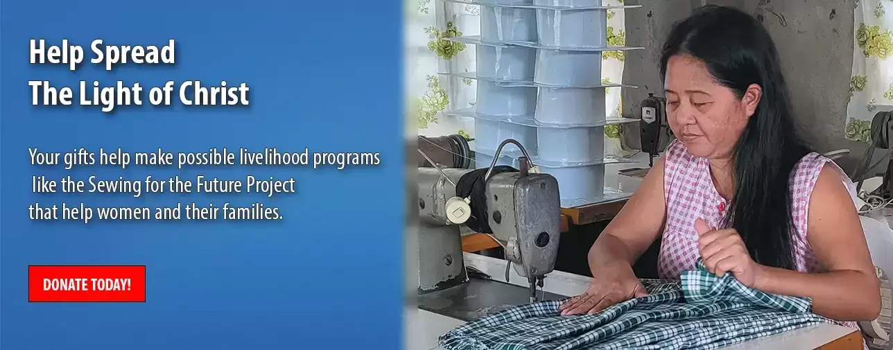 Woman at a sewing machine working at the Sewing for the Future Project