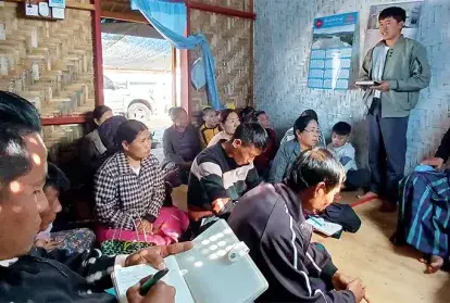 The head of the family says his prayer intentions during the church group