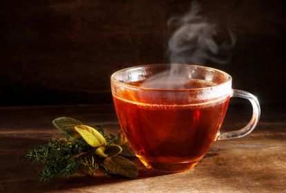 Steaming cup of tea on a table