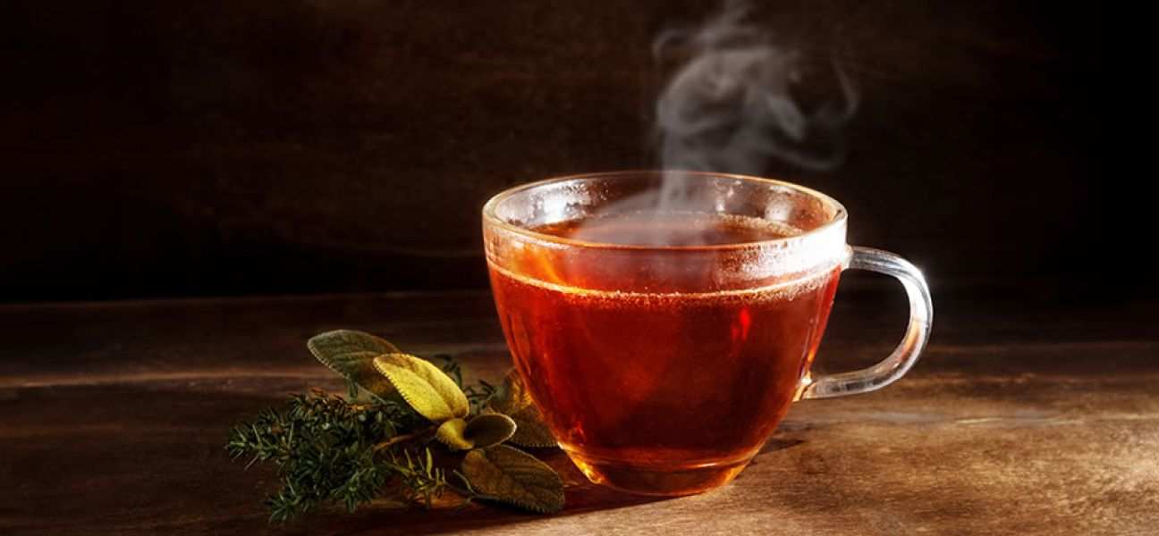 Steaming cup of tea on a table