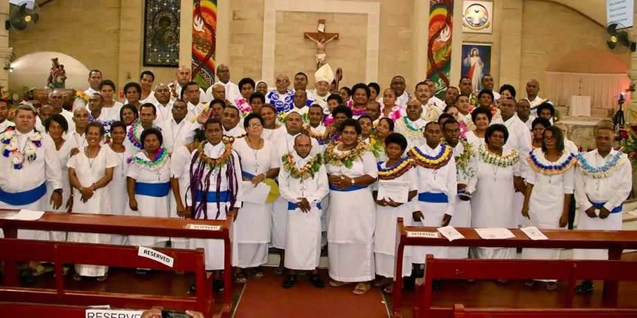 58 newly installed Catechists with Archbishop Peter Loy