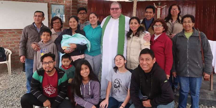 Fr. George Hogarty with the parishioners of the Sacred Heart of Jesus. 