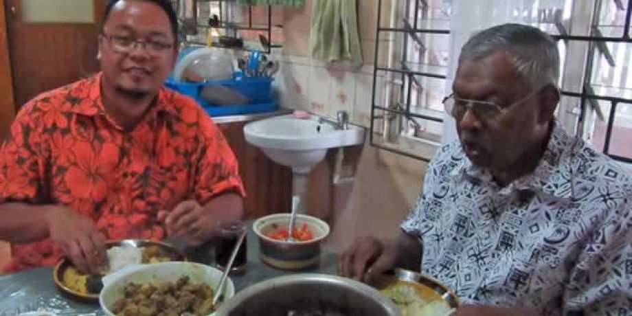 Fr. Kurt eating lunch with Uncle Bale