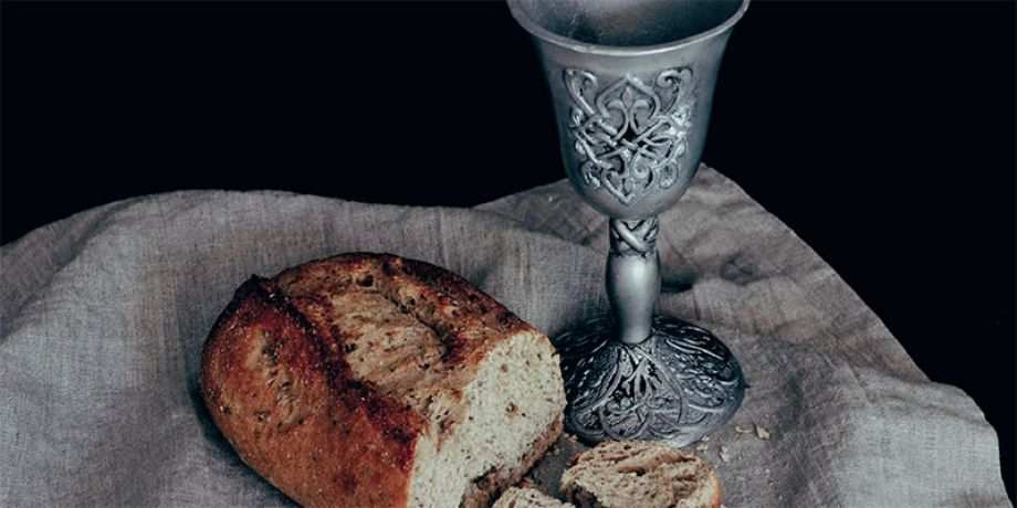 Bread and wine signifying the Body and Blood of Christ