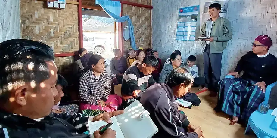 The head of the family says his prayer intentions during the church group