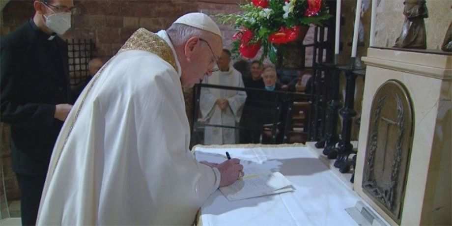 Pope Francis signing the Encyclical, Fratelli Tutti