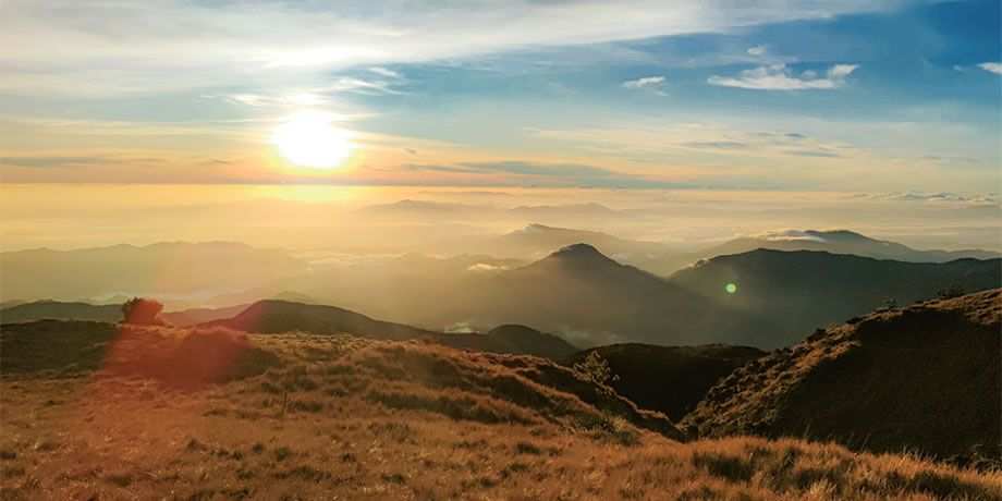 Rolling hills at sunset