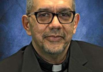 Fr. Chris Saenz, Director