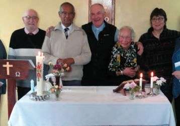 Fr. John Boles with Maurice and Jean Soord and other parishioners after Mass on Sunday on Sanday!