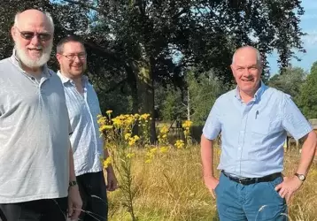 Fr. John Boles (right) and two members of the Columban group that visited the Salford Laudato Si’ Center