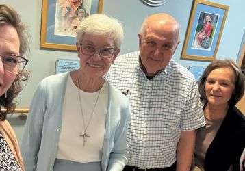 Pictured, from left, are Angela Bennett, Sister Mary Ellen, Fr. John Burger, Angie Determan, Columban lay missionary Sainiana Tamatawale.